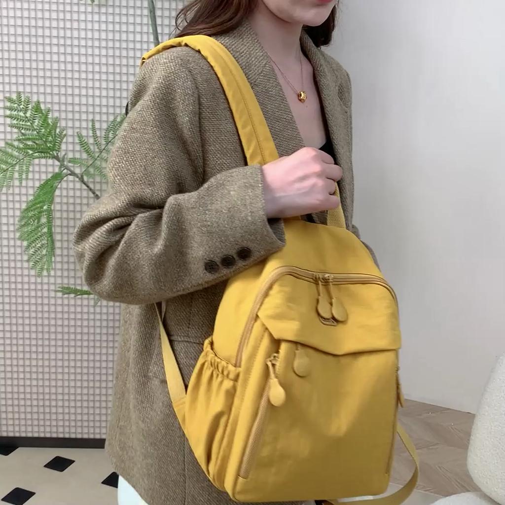 Compact Lightweight Backpack with Multiple Pockets and Front Flap Design for Daily Use and Travel