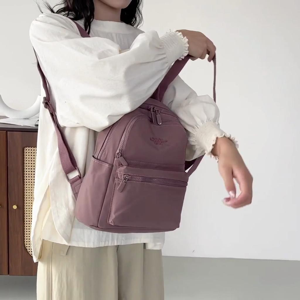 Compact Backpack with Front Zip Pocket Casual Shouler Bag for Daily Use