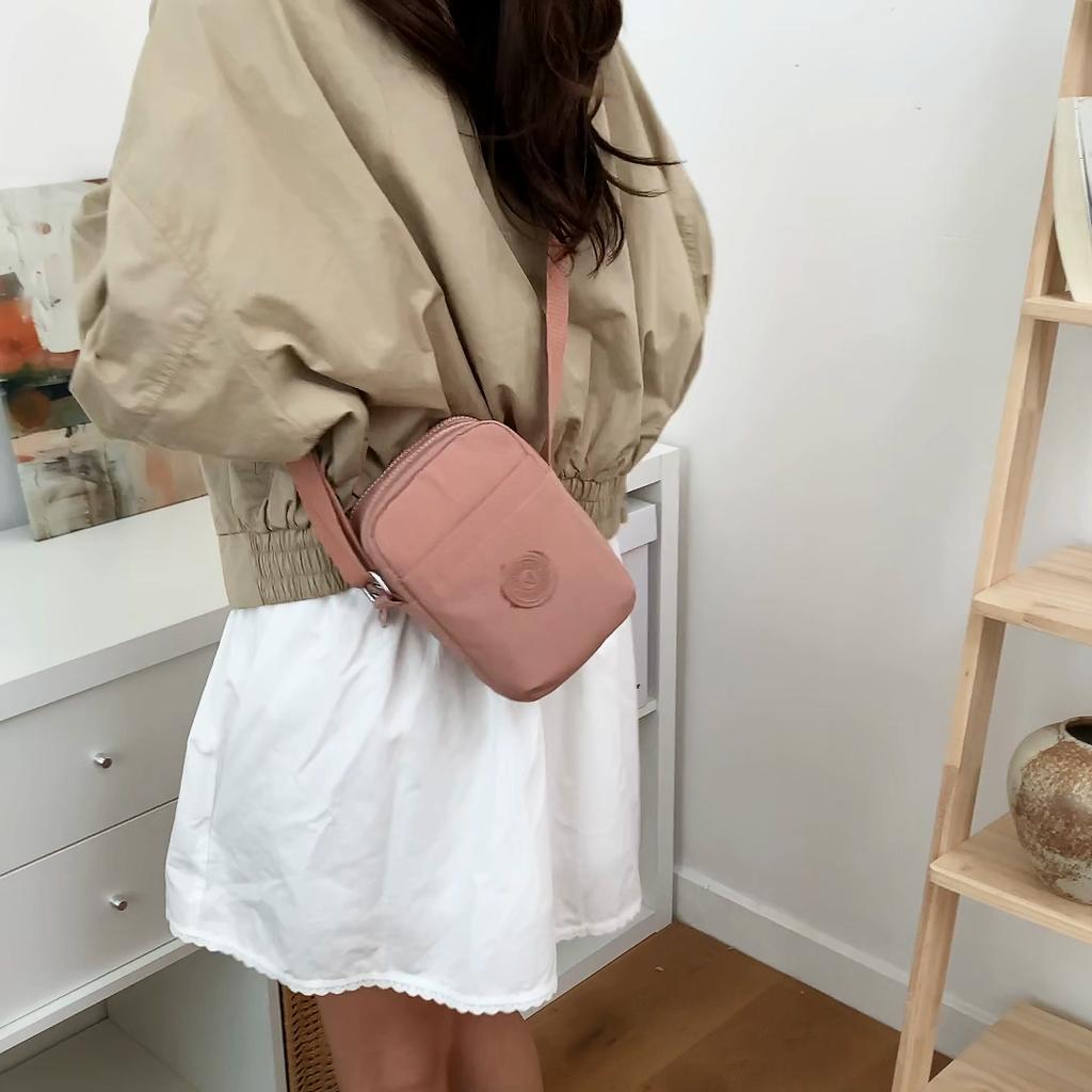 Compact Nylon Crossbody Bag with Double Zipper Closure Adjustable Strap Small Casual Purse for Daily Travel