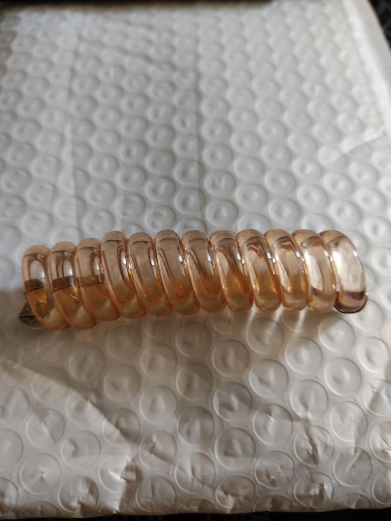 Coda di cavallo con anello per capelli - Italia