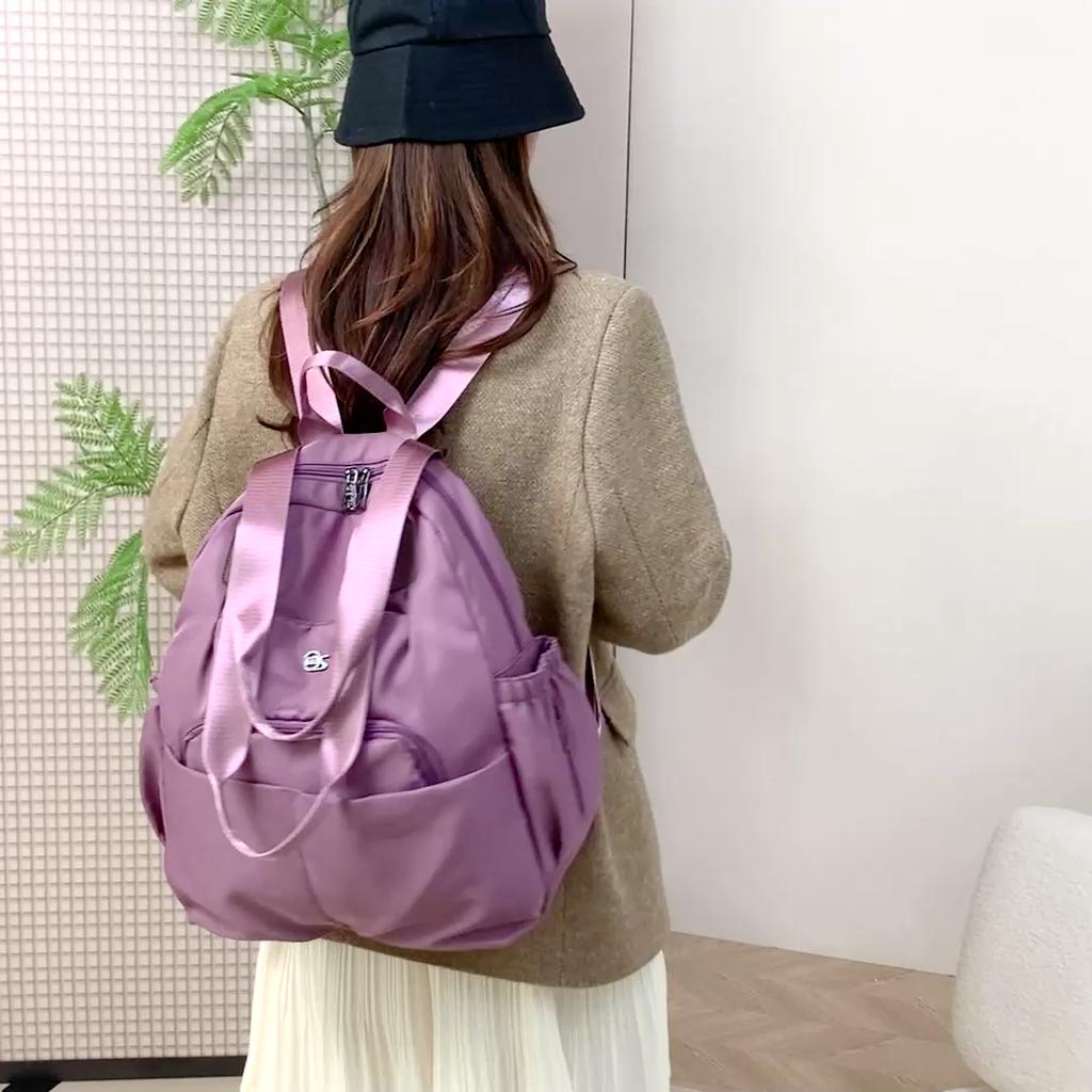 Fashionable Lightweight Backpack with Multiple Carrying Styles and Spacious Compartments for Daily Use