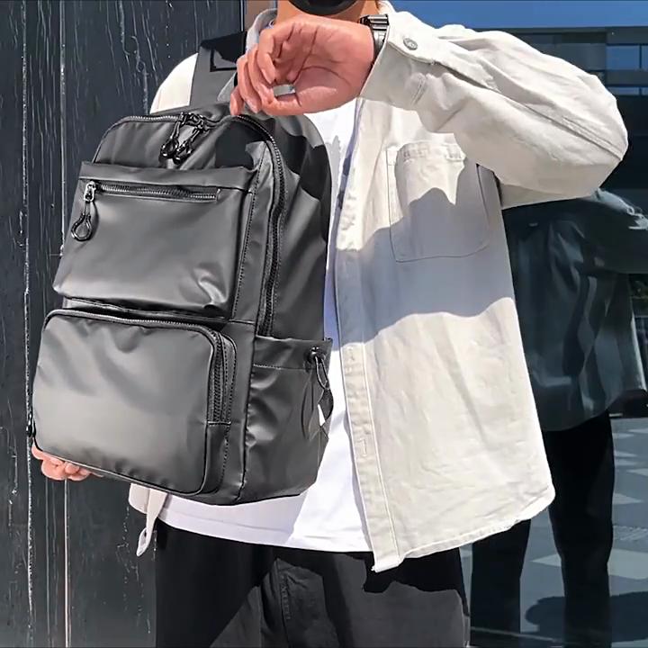 Nový unisexový jednobarevný voděodolný a prodyšný business fashion ležérní všestranný batoh na každý den