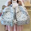 Star-Printed Backpack with Front Zipper Pocket and Tassel Details for School and Daily Use