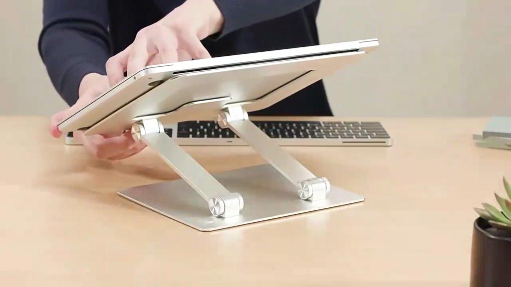 Basics Sturdy and Portable Ergonomic Laptop Stand for Desk, Adjustable Riser, Fits All Laptops and Notebooks Up To 17.3 Inch, Silver, 10 X 8.7 X 6 In