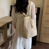 Woven Straw Tote with Tassel Accent and Spacious Interior for Summer Beach or Casual Daily Use