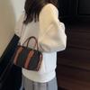 Classic Canvas Duffel Bag with Leather Trim and Adjustable Strap Perfect for Travel and Everyday Use