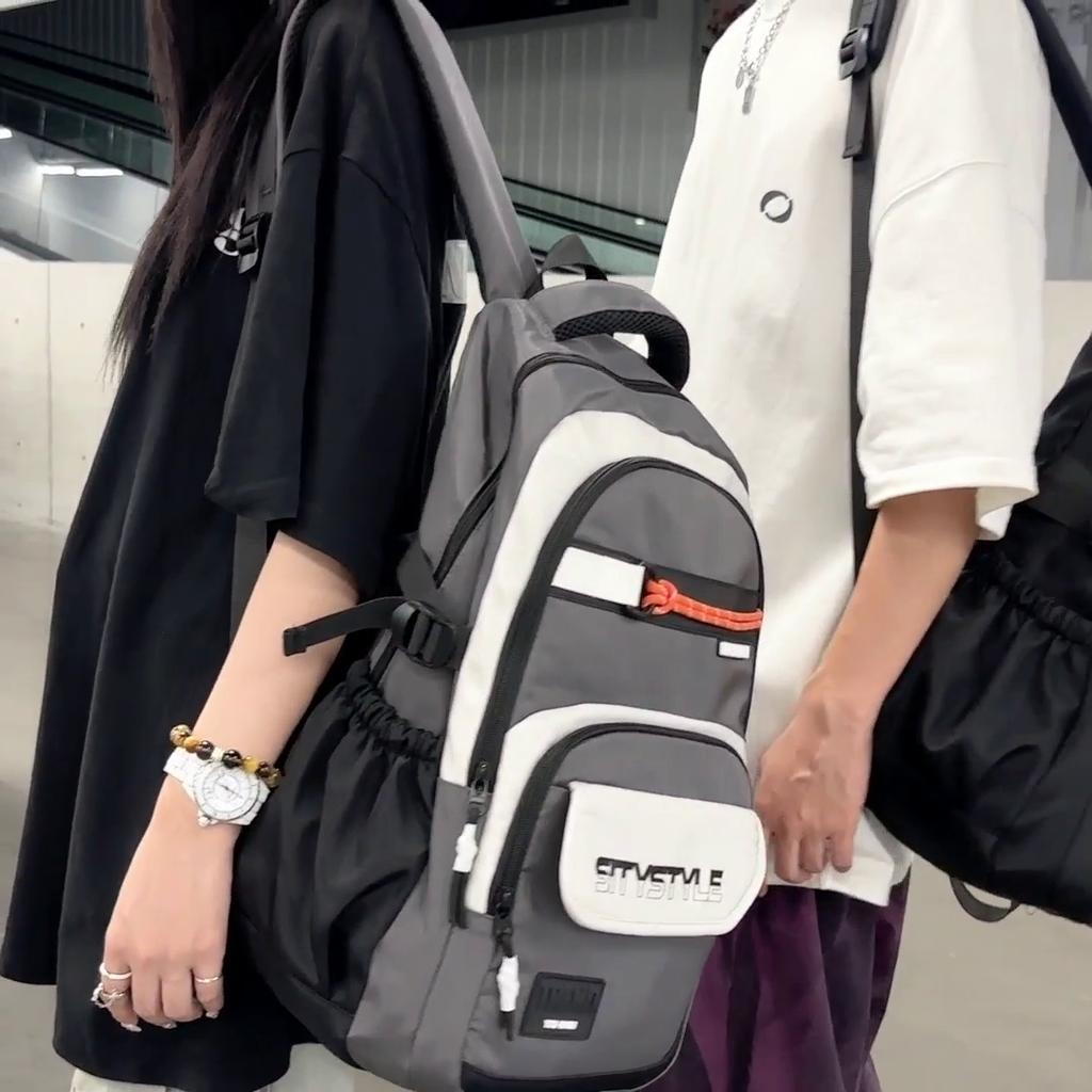 Großer, leichter Schulranzen für Mittelschüler mit großem Fassungsvermögen und Farbblock-Design für Herren