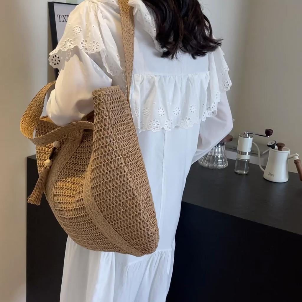 Handwoven Straw Tote Bag Women's Summer Beach Bag with Tassel Detail and Lightweight Design