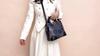 2025 New Embossed Pattern Fashionable Versatile Shoulder Crossbody Handbag