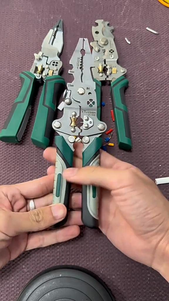 Heavy-duty Multi-functional Wire Stripper, One-piece Foldable Crimping Pliers with Non-slip Handle, Made of Metal.