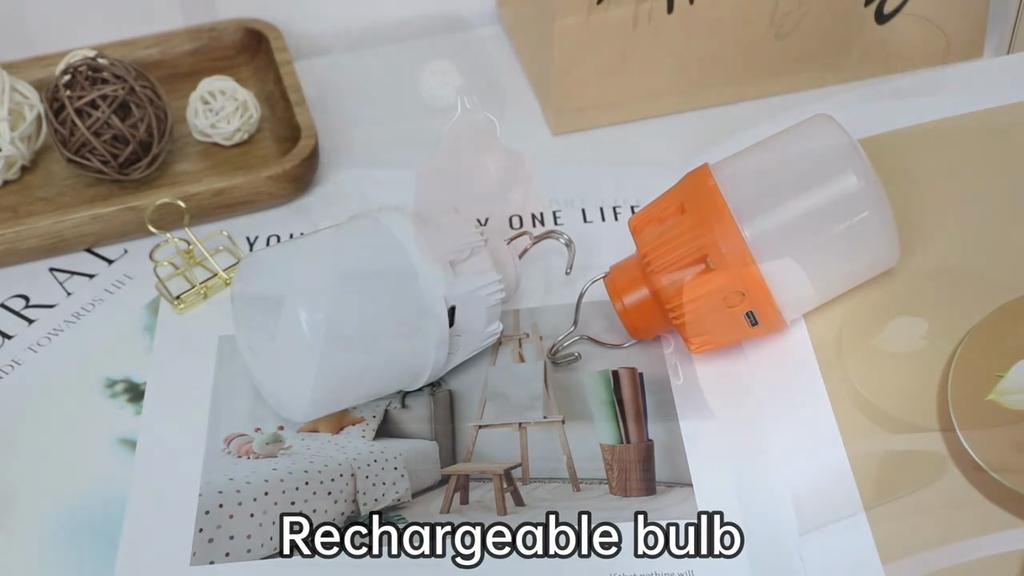 Portable rechargeable LED camping light, USB rechargeable emergency flashlight, adjustable brightness.