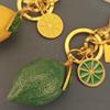 Fruit Bag Charm Key Holder With Electroplated Alloy Material And Lemon Pattern For Women