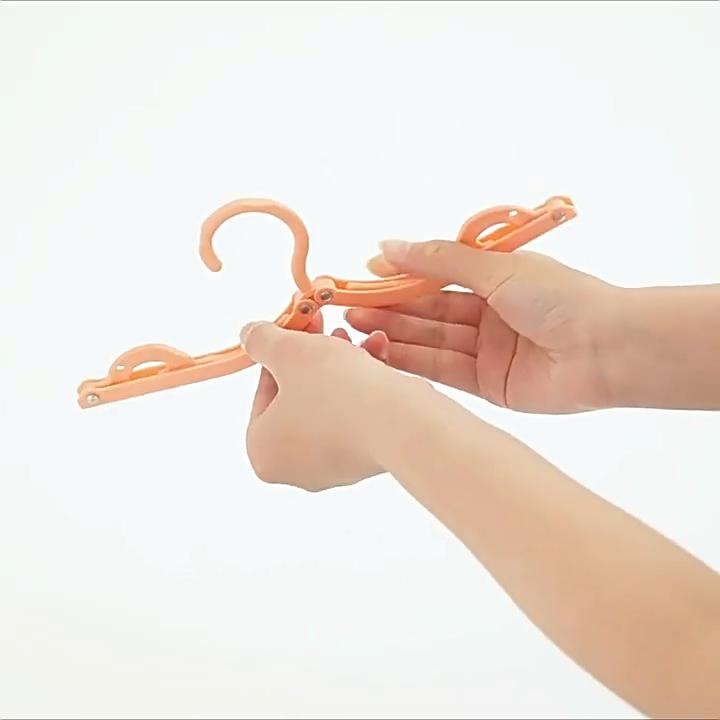 Tragbarer, zusammenklappbarer Kleiderbügel für Geschäftsreisen, magisch, einfarbig, rutschfest, multifunktionaler Mini-Wäscheständer