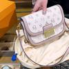 Presbyopia Retro Leather Saddle Bag Female 2023 New Niche Texture Joker Shoulder Messenger Bag with Small Bag In Hand.