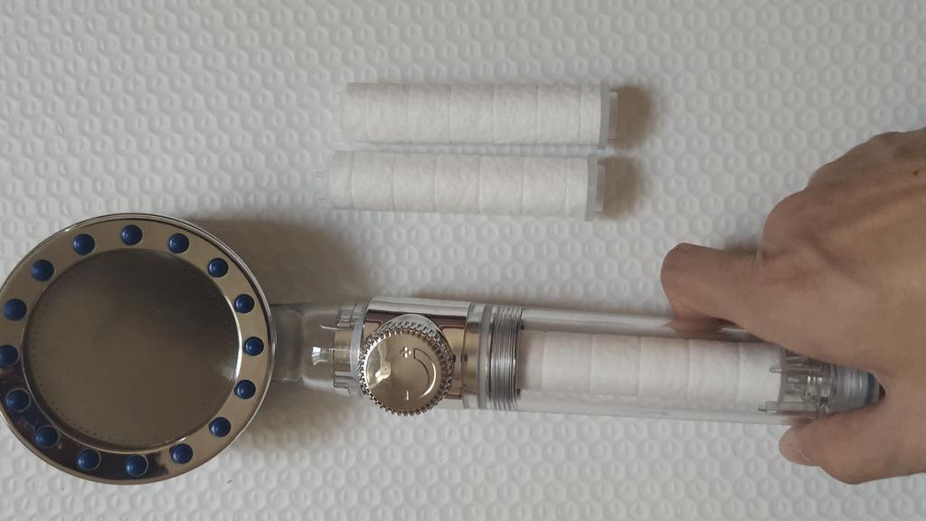 New Propeller Driven PP Cotton Filter Shower Head with Stop Button Turbocharged High Pressure Handhoeld Shower Nozzle