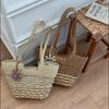 Handwoven Natural Fiber Tote Bag with Braided Handles and Open Weave Design