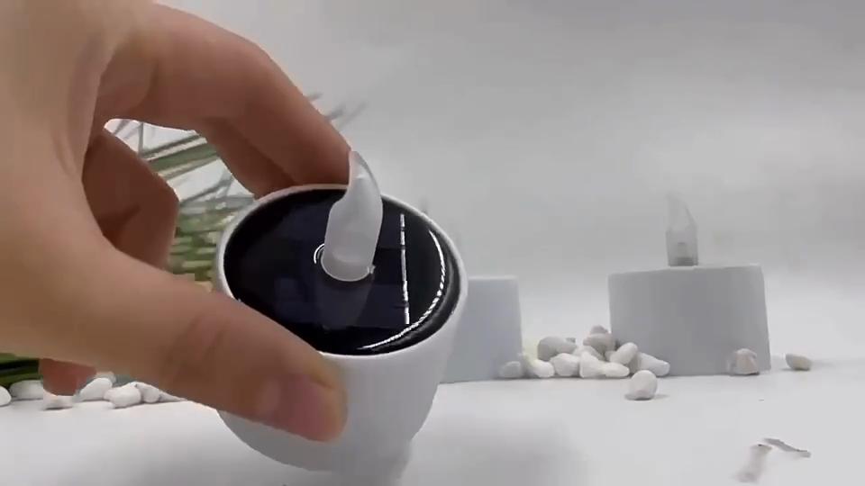 Flameless pumpkin candle, solar powered evil flickering Halloween desktop ghost pumpkin LED tea light candle, Halloween decoration