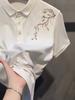 Polo Homme Manches Courtes Col à Revers Brodé Fleurs de Prunier Blanches