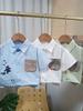 Boys' short sleeved two-piece set with cartoon printed shirt and casual shorts High-quality clothes for Boys