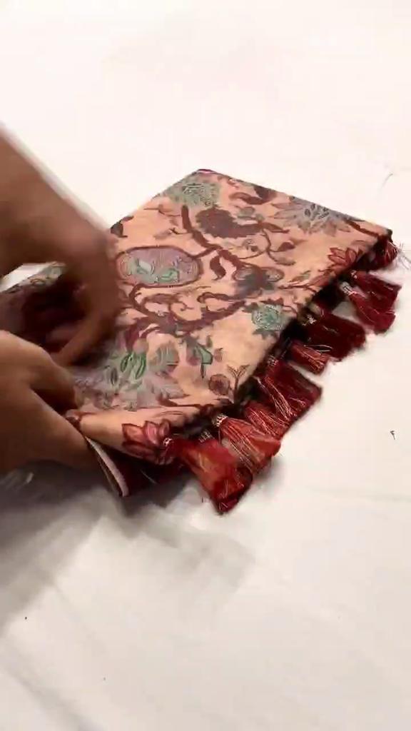 Italian Digital Printing Technology On Cotton Weaves. The Fabric Is Soft and Easy To Drape. Beautiful Pallu and Border All Over the Saree with Tassels