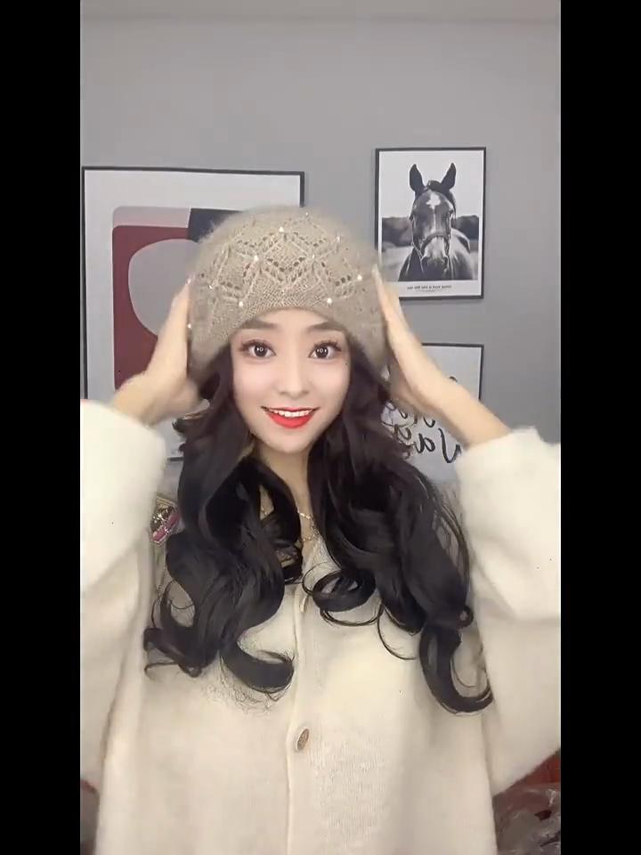 Korean version of fashion pearl headgear ear protection knitted heap hat winter handmade thickened warm mother wool hat women