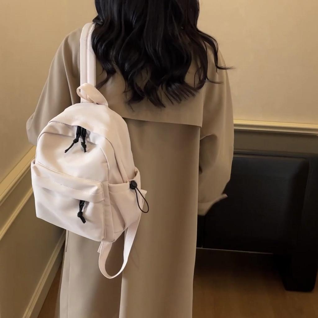 Minimalist Backpack for Women and Men Lightweight Nylon School Bag with Front Pocket