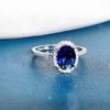 BELLA BOX Klassischer Damenring mit ovaler Form, blauen Edelsteinen, Zirkon, silberfarben, Finger, Hochzeit, Verlobung, Brautschmuck