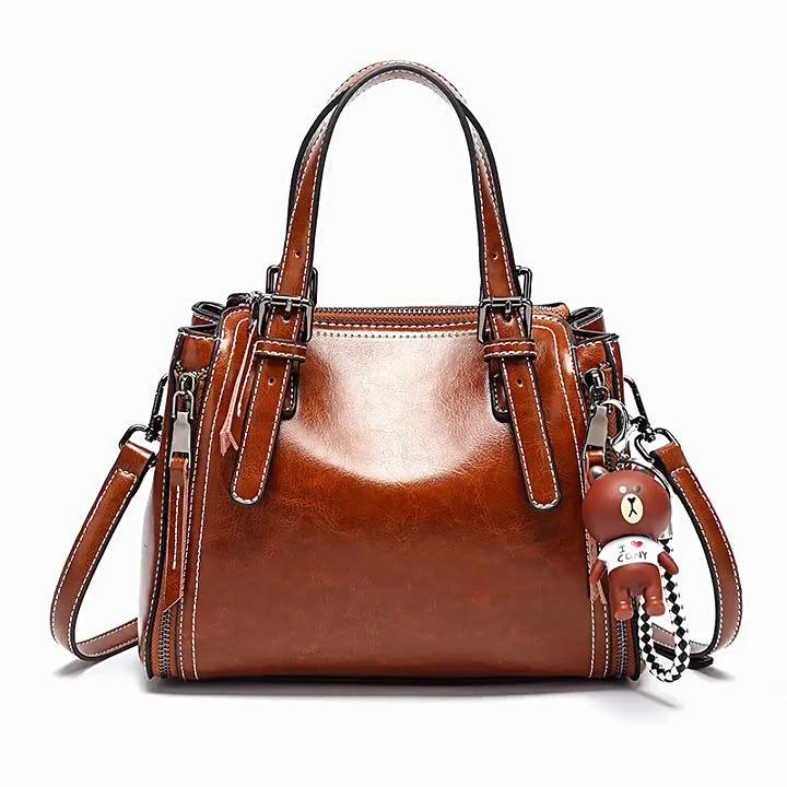 2025 Ρετρό Γνήσιο Δέρμα Μικρές Γυναικείες Τσάντες Χειρός Δέρμα Αγελάδας Με Κερί Λαδιού Τσάντα Ώμου Χιαστί Με Διακοσμητικό Αρκουδάκι Τσάντα Χειρός Πορτοφόλι