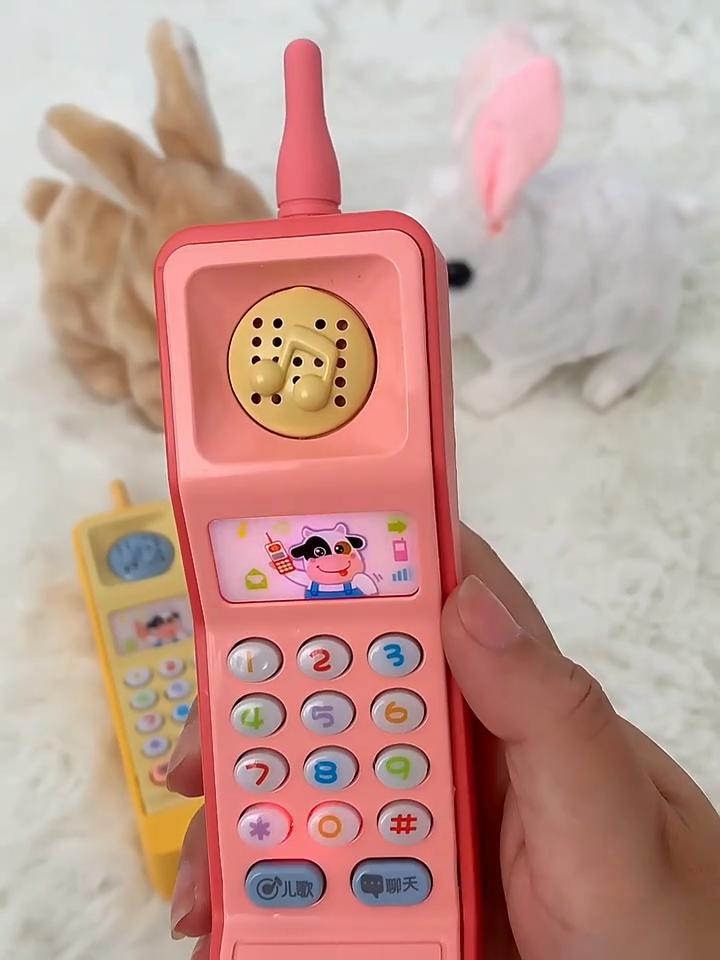 Vintage Cartoon Handyspielzeug mit blinkenden Lichtern und Musik für Kinder zum Schlafen und Lernen