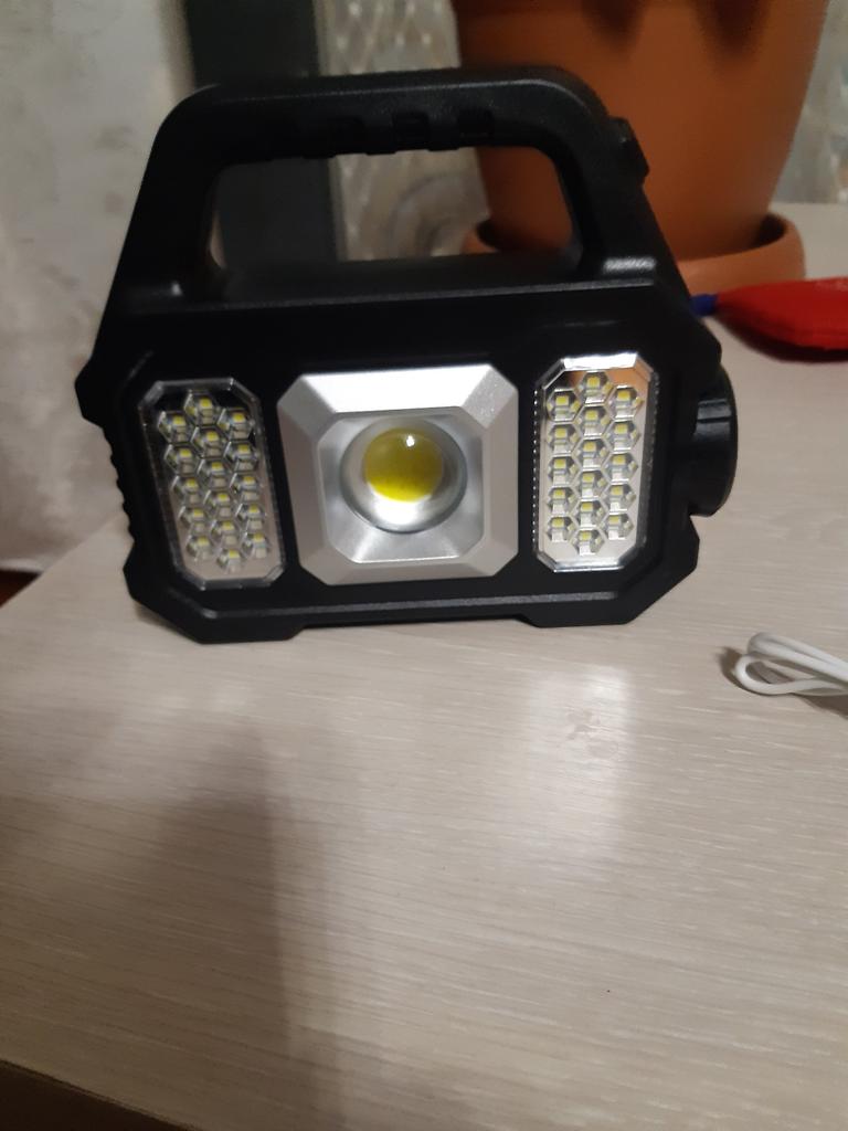 Faro LED Ricaricabile 100W – 12000LM Con Pannello Solare, 13000mAh, 4 Modalità Luce, Per Campeggio E Emergenze