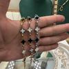 Net Red Temperament Black And White Four-Leaf Clover Titanium Steel Bracelet Female Niche Design String Sweet Girl Hand Accessories