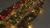 9FT Christmas Garland with Lights - Pre-Lit Artificial Green Christmas Garland for Stair Railings Mantle Decorations with Red Flowers, Berry Clusters