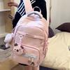 Einfacher einfarbiger Rucksack mit Buchstabenmuster für Schüler, mit Anhänger, für Schule, Bildung und 15-Zoll-Laptop-Aufbewahrung