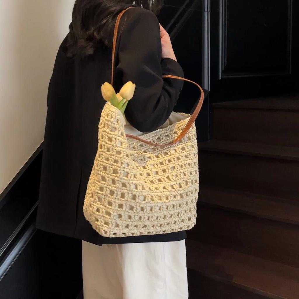 Handwoven Straw Tote Bag with Leather Handles and Open Weave Design Perfect for Summer Beach and Casual Outings