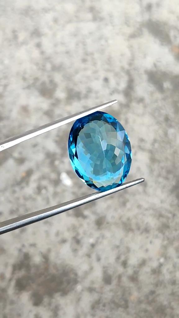 15.90 Carat, Lab Created London Blue Topaz Faceted Stone, Oval Shape Cut Stone For Multiple Jewelry Uses Lab Created Gemstone, 18x13x8 MM.